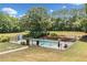 In-ground pool with surrounding landscaping at 289 Barn Rd, Canton, GA 30115