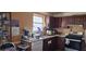 Bright kitchen with wood cabinets, stainless steel appliances, and ample counter space at 1041 Heritage Valley Rd, Norcross, GA 30093