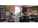 Bright kitchen with wood cabinets, stainless steel appliances, and ample counter space at 1041 Heritage Valley Rd, Norcross, GA 30093