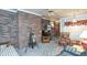 Spacious basement with brick wall and seating area at 1526 N Cherokee N Rd, Social Circle, GA 30025