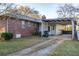 Brick house with carport and lattice detail at 1526 N Cherokee N Rd, Social Circle, GA 30025