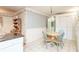 Small dining area with round table and four chairs at 1526 N Cherokee N Rd, Social Circle, GA 30025