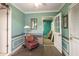 Room with hair styling chair and equipment, open doorway to another room at 1526 N Cherokee N Rd, Social Circle, GA 30025