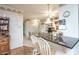 Kitchen features granite countertop breakfast bar and white cabinetry at 1526 N Cherokee N Rd, Social Circle, GA 30025