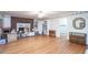 Living room with hardwood floors and brick fireplace at 1526 N Cherokee N Rd, Social Circle, GA 30025