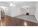 Living room with hardwood floors, fireplace, and ceiling fan at 7601 Watson Cir, Locust Grove, GA 30248