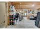 Unfinished basement with storage containers, exposed framing, and concrete floor at 5712 Overlook Circle, Powder Springs, GA 30127