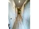 Bright hallway with light wood-look flooring and white doors at 18 Garmon Rd, Hiram, GA 30141