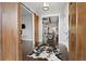 Elegant entryway with hardwood floors, barn door, and cowhide rug at 655 Flower Farm Dr, Acworth, GA 30101