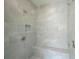 Large walk-in shower with gray tile and built-in seat at 103 Terrace View Dr, Acworth, GA 30101