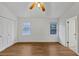 Spacious bedroom with hardwood floors, ceiling fan and double closets at 1255 Whitlock Ridge Sw Dr, Marietta, GA 30064