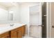 Bathroom with a large vanity, white countertop, and oak cabinets at 14 Rhodes Dr, Marietta, GA 30068