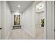 Basement hallway with neutral walls and carpet at 525 Forest Hills Dr, Atlanta, GA 30342