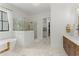 Spa-like bathroom featuring a soaking tub, large shower, and modern vanity at 336 Mont Harmony Sw Rd, Powder Springs, GA 30127