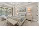 Main bedroom with large bed, seating area, and window views at 336 Mont Harmony Sw Rd, Powder Springs, GA 30127