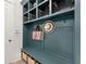 Functional mudroom with built-in bench, cubbies, and hooks at 336 Mont Harmony Sw Rd, Powder Springs, GA 30127