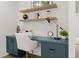 Home office with built-in desk and floating shelves at 336 Mont Harmony Sw Rd, Powder Springs, GA 30127