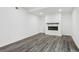 Finished basement featuring a modern electric fireplace and wood-look flooring at 4051 Glenda Dr, College Park, GA 30337