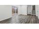 Bright basement room featuring sliding glass doors and wood-look flooring at 4051 Glenda Dr, College Park, GA 30337