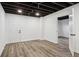 Finished basement offers extra living space with new flooring and recessed lighting at 4051 Glenda Dr, College Park, GA 30337