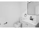 Basement bathroom with white vanity, black matte fixtures, and a frameless mirror at 4051 Glenda Dr, College Park, GA 30337