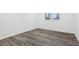 Empty bedroom with grey vinyl flooring and a window at 4051 Glenda Dr, College Park, GA 30337