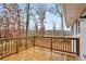 Wooden deck overlooks wooded backyard at 4051 Glenda Dr, College Park, GA 30337