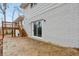 Rear exterior view showing patio, deck and sliding glass doors at 4051 Glenda Dr, College Park, GA 30337