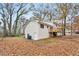 Back of house with deck and wooded backyard at 4051 Glenda Dr, College Park, GA 30337
