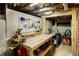 Well-equipped basement workshop featuring workbench, tools, and ample storage at 531 Wabash Ne Ave, Atlanta, GA 30312