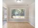 Dining area with hardwood floors and sliding glass doors to patio at 100 Bailey Ct, Fayetteville, GA 30215