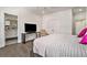 Bright bedroom with large bed, TV, and ensuite bathroom at 1145 Kirkwood # 4, Atlanta, GA 30316