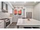 Modern kitchen with geometric backsplash and stainless steel appliances at 1145 Kirkwood # 4, Atlanta, GA 30316