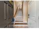 Wooden staircase with white risers and a stained glass window at 216 Semel Nw Dr # 376, Atlanta, GA 30309