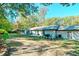Spacious backyard with patio, grill, and lush landscaping at 2230 Old Fountain Rd, Lawrenceville, GA 30043