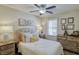 Charming bedroom with a full bed and decorative accents at 2230 Old Fountain Rd, Lawrenceville, GA 30043