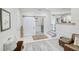Entryway with tile flooring, barn door, and a cozy sitting area at 2230 Old Fountain Rd, Lawrenceville, GA 30043