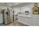 Kitchen features stainless steel appliances and white cabinets at 2230 Old Fountain Rd, Lawrenceville, GA 30043