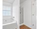 Bright bathroom with a separate shower and a jetted tub at 3648 Silver Springs Ct, Decatur, GA 30034