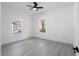 Bright bedroom with ceiling fan and hardwood floors at 1097 Hubbard Sw St, Atlanta, GA 30310