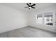 Bright bedroom with ceiling fan, hardwood floors, and large windows at 1097 Hubbard Sw St, Atlanta, GA 30310