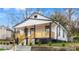 Renovated cottage with a stylish front porch and updated landscaping at 1097 Hubbard Sw St, Atlanta, GA 30310