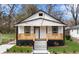 Newly constructed home with a modern exterior and a welcoming front porch at 1097 Hubbard Sw St, Atlanta, GA 30310