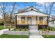 Recently renovated home with a charming front porch and updated landscaping at 1097 Hubbard Sw St, Atlanta, GA 30310