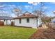 White house exterior with a brown roof and small yard at 1097 Hubbard Sw St, Atlanta, GA 30310