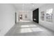 Open living area with hardwood floors and access to back patio at 1097 Hubbard Sw St, Atlanta, GA 30310