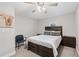 Cozy bedroom with a queen-size bed and dark wood furniture at 3465 Callie Still Rd, Lawrenceville, GA 30045