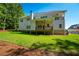 Spacious backyard of a two-story home with a large deck, perfect for outdoor entertaining at 119 Terrace View Dr, Acworth, GA 30101