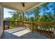 Private balcony with wooden railing and scenic wooded views at 119 Terrace View Dr, Acworth, GA 30101