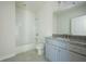 Bathroom with gray vanity, granite countertop, and tiled shower/tub combo at 119 Terrace View Dr, Acworth, GA 30101